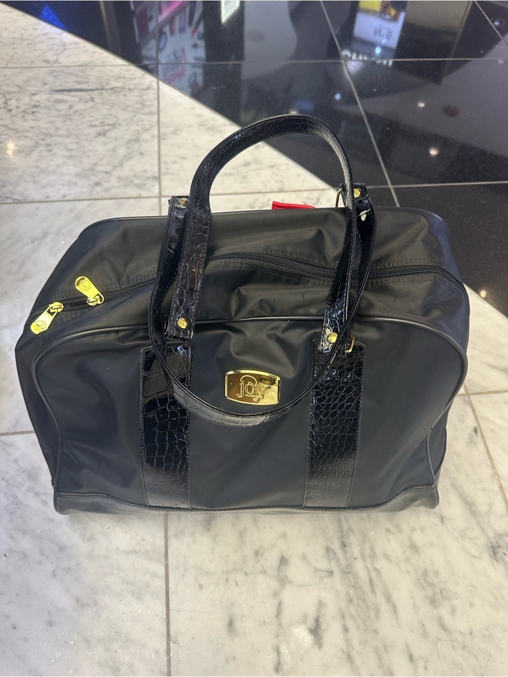 Black Designer Travel Tote with Gold Plaque
